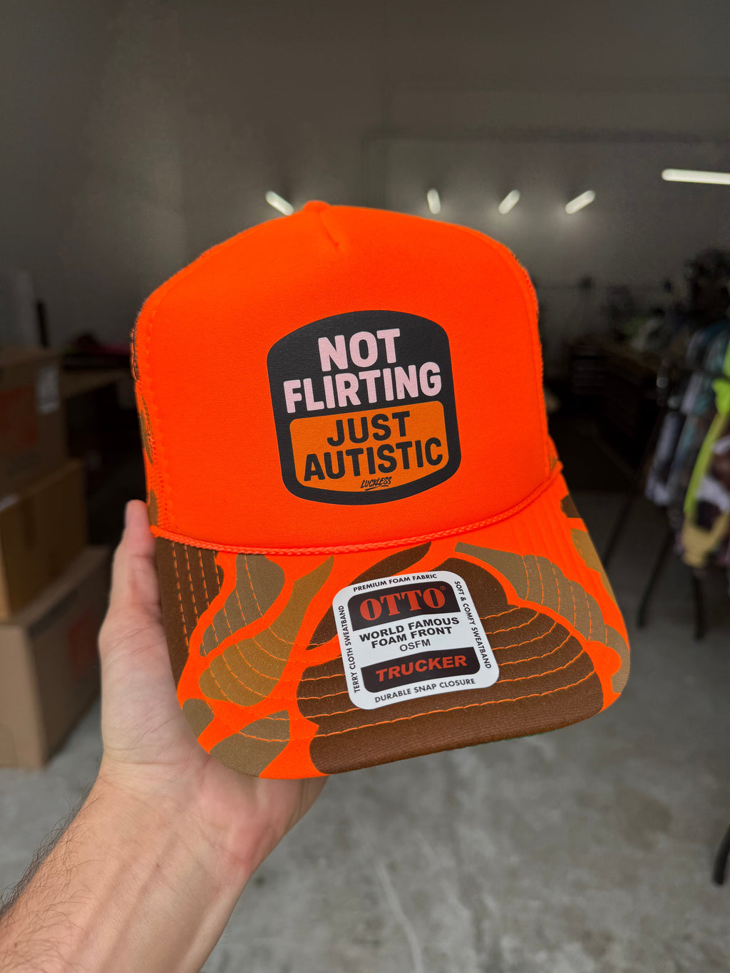 Luckless Outfitters Not Flirting Trucker Hat — detail close-up