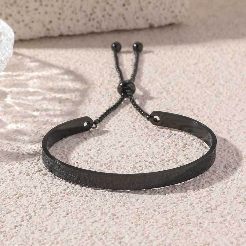 Mariam's Collection Double-sided engraved men's and women's non-fading titanium steel bracelet… — Mariam's Collection branding close-up
