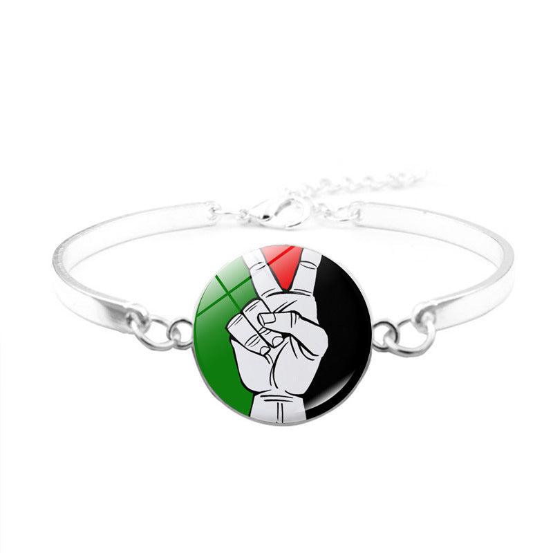 Mariam's Collection Free Palestine Bracelet | Palestinian Flag Keffiyeh Bracelet (MAC081) — Mariam's Collection branding close-up
