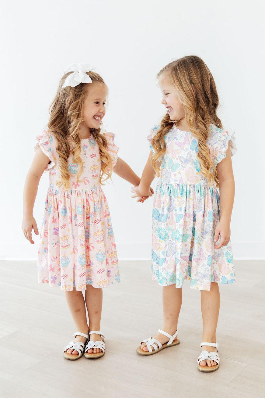 Mila & Rose ® Off to the Circus Flutter Sleeve Twirl Dress — back view