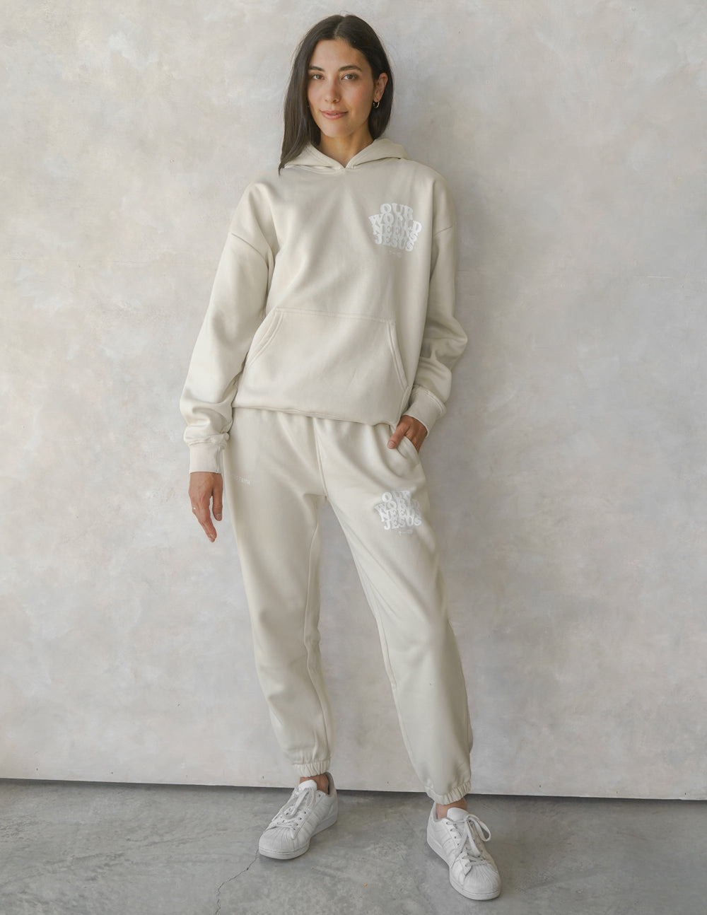 Elevated Faith Our World Needs Jesus Beige Unisex Sweatpant — detail close-up