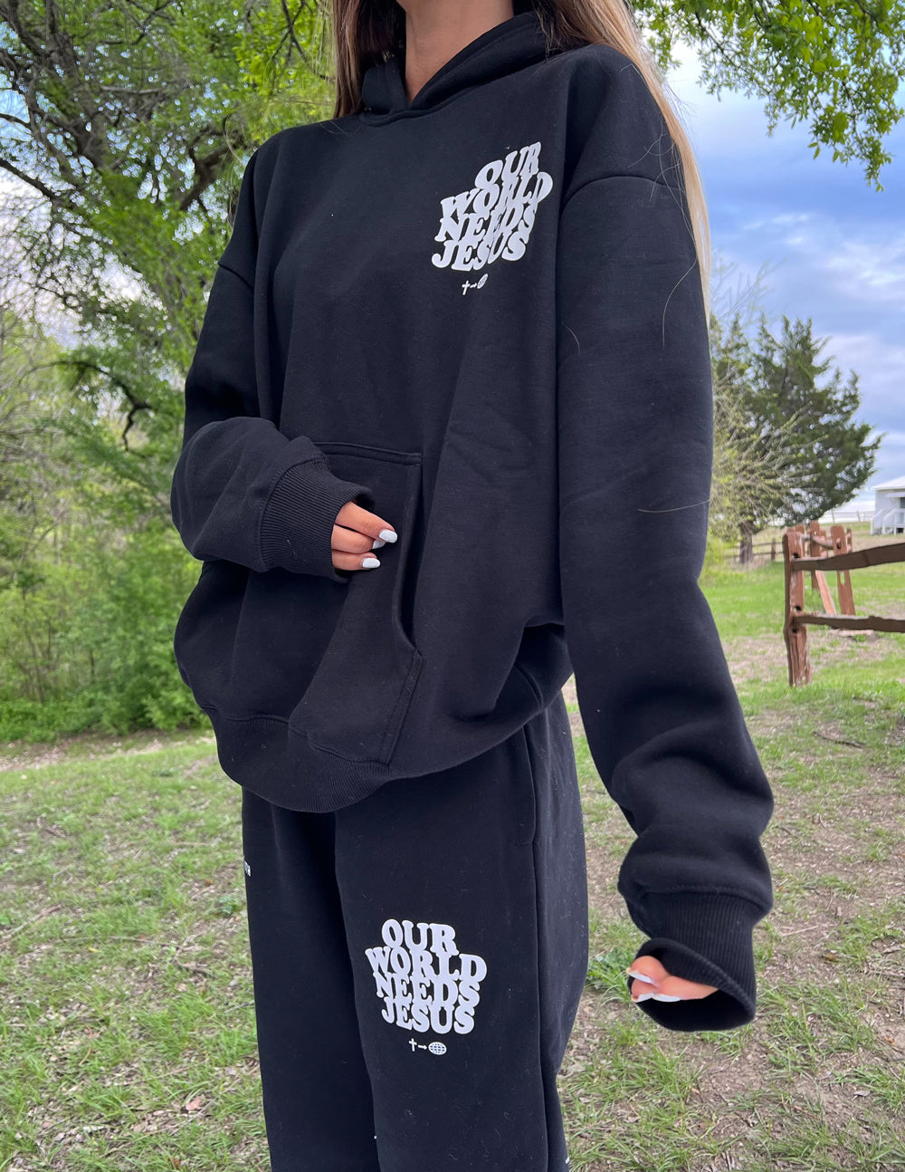 Elevated Faith Our World Needs Jesus Black Unisex Sweatpant — side view