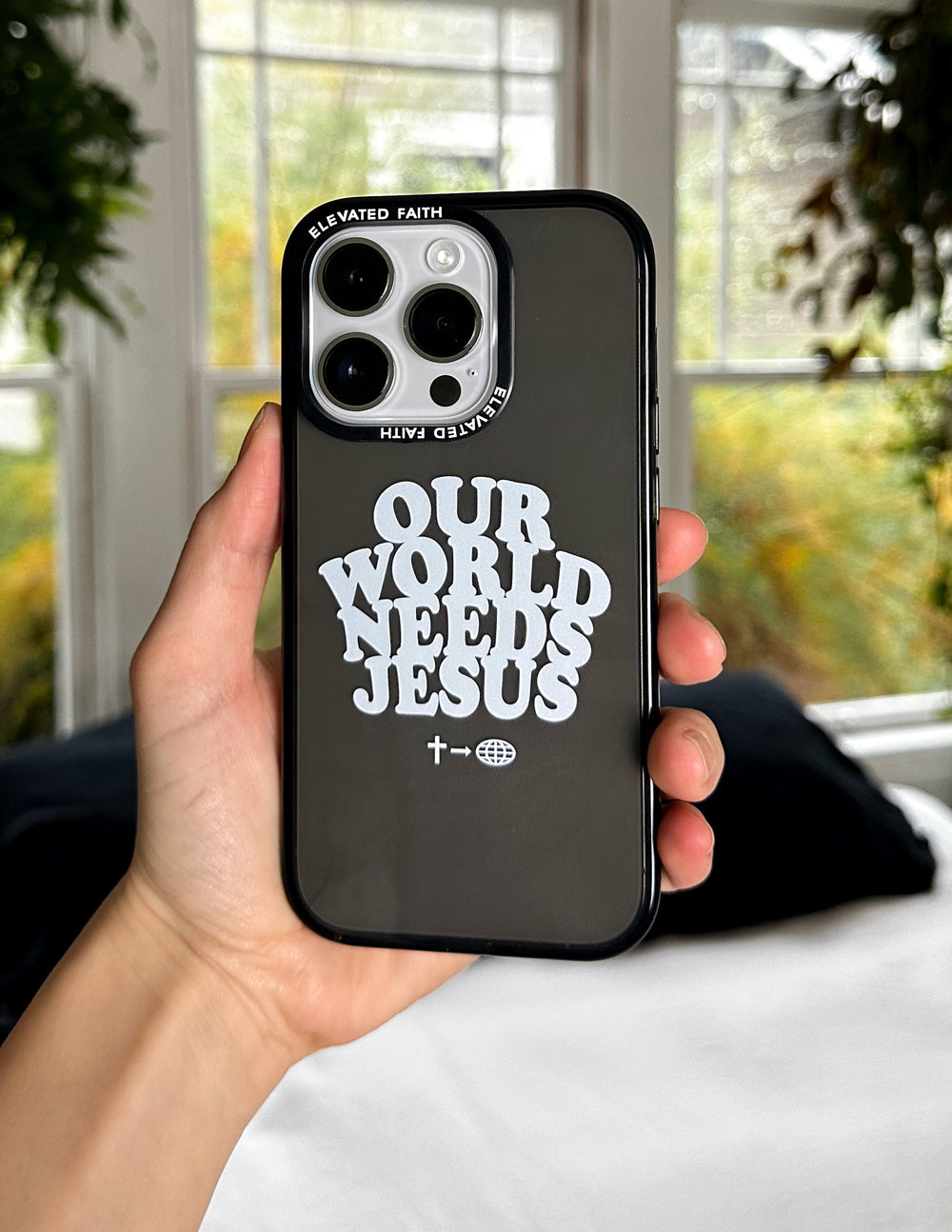 Elevated Faith Our World Needs Jesus Phone Case — detail close-up