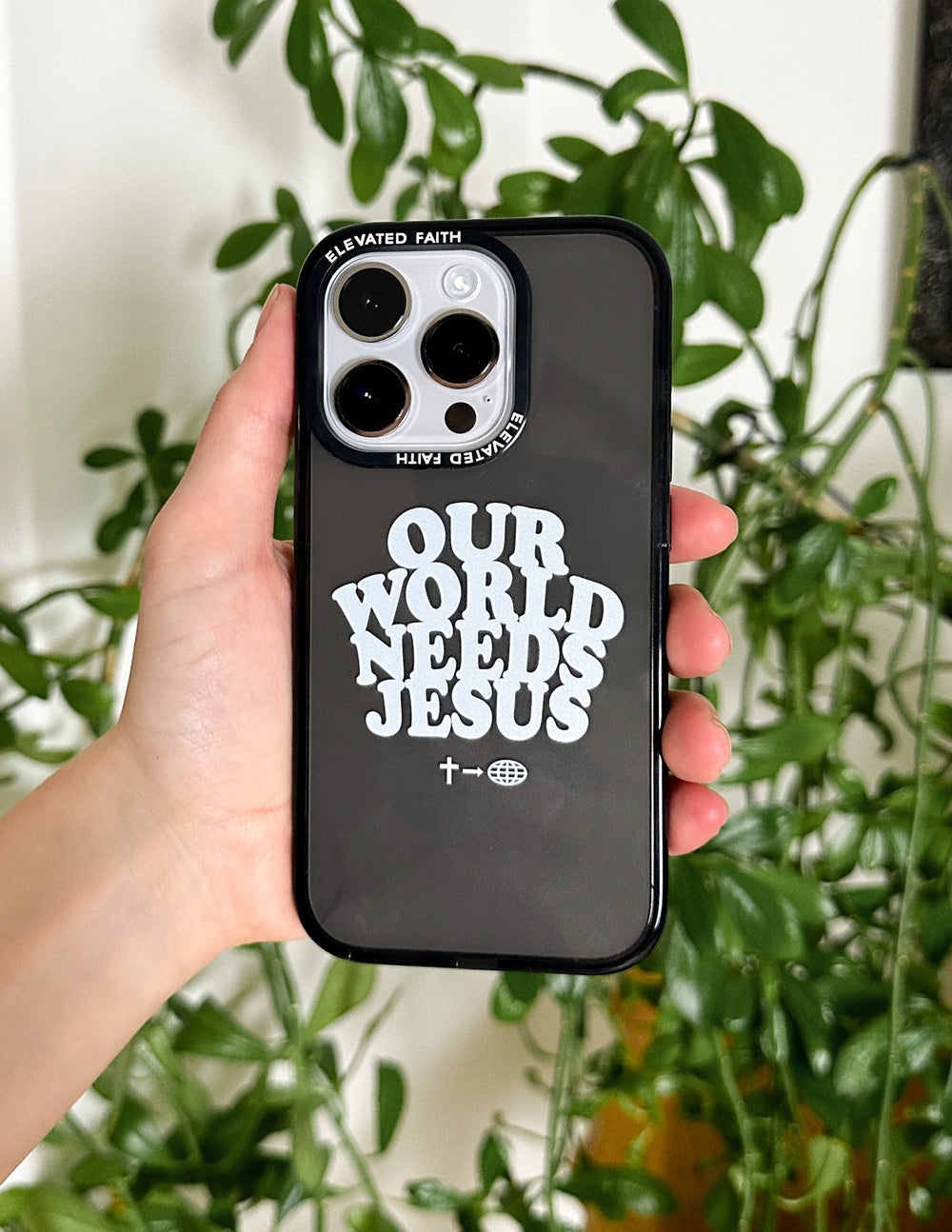 Elevated Faith Our World Needs Jesus Phone Case — lifestyle context