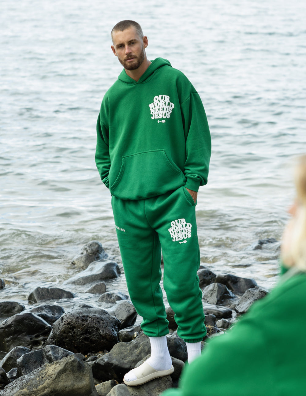 Elevated Faith Our World Needs Jesus Unisex Hoodie — detail close-up