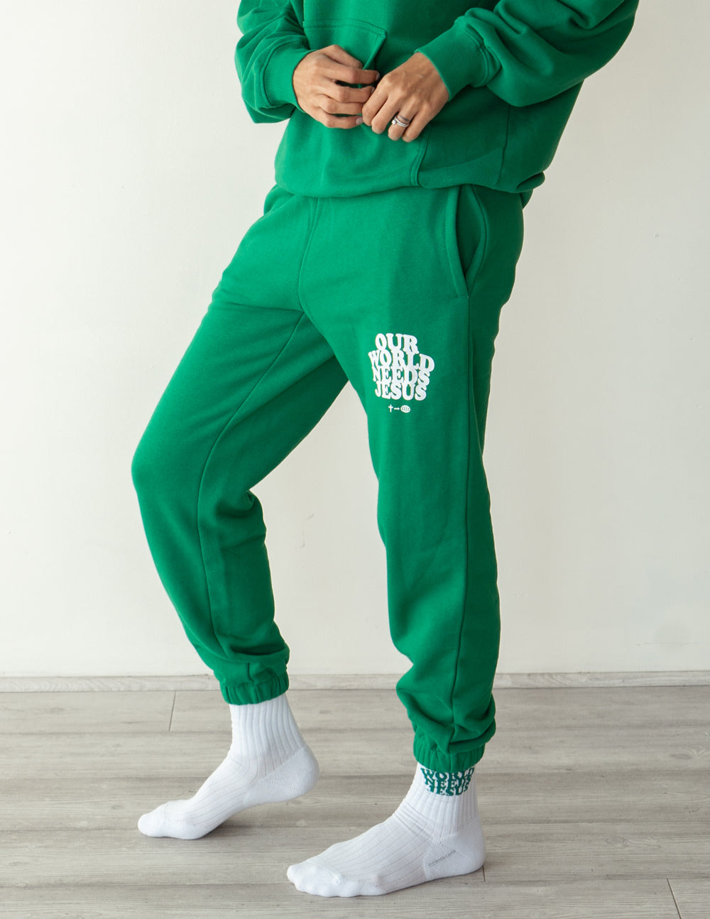 Elevated Faith Our World Needs Jesus Unisex Sweatpant — in-use photo