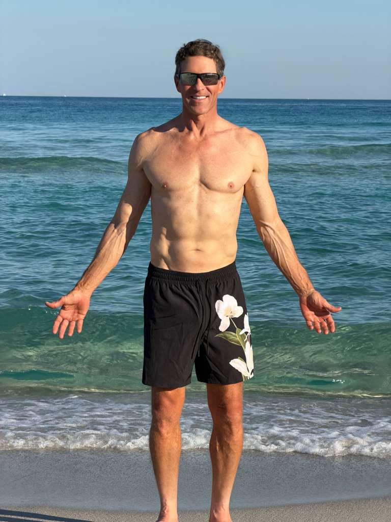 LA'AVANA Black Floral  swim trunk — lifestyle context
