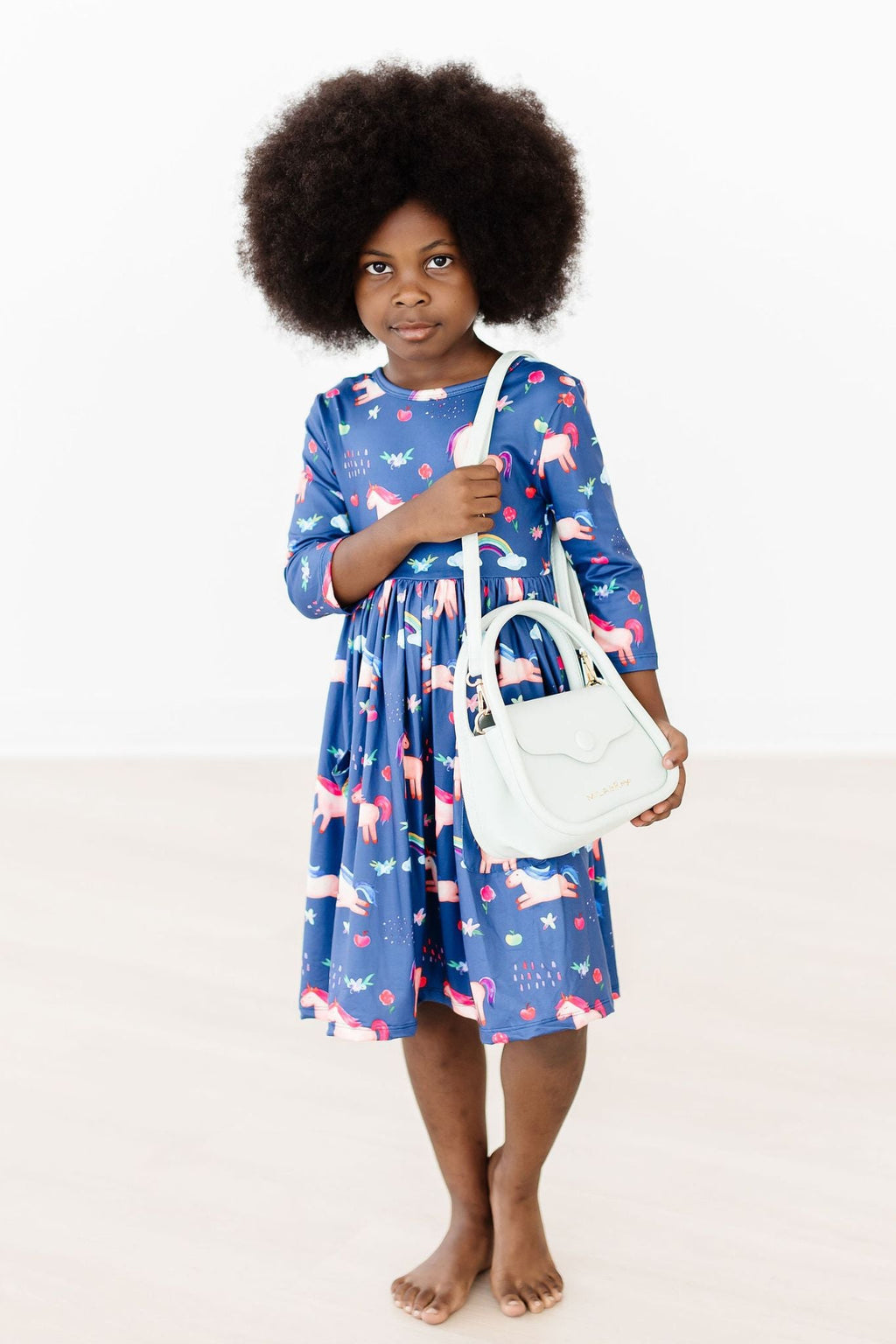Mila & Rose ® Painted Skies 3/4 Sleeve Pocket Twirl Dress — side view