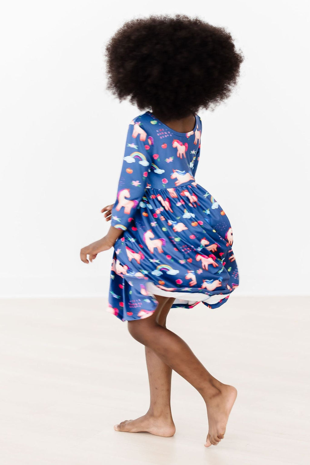 Mila & Rose ® Painted Skies 3/4 Sleeve Pocket Twirl Dress — back view