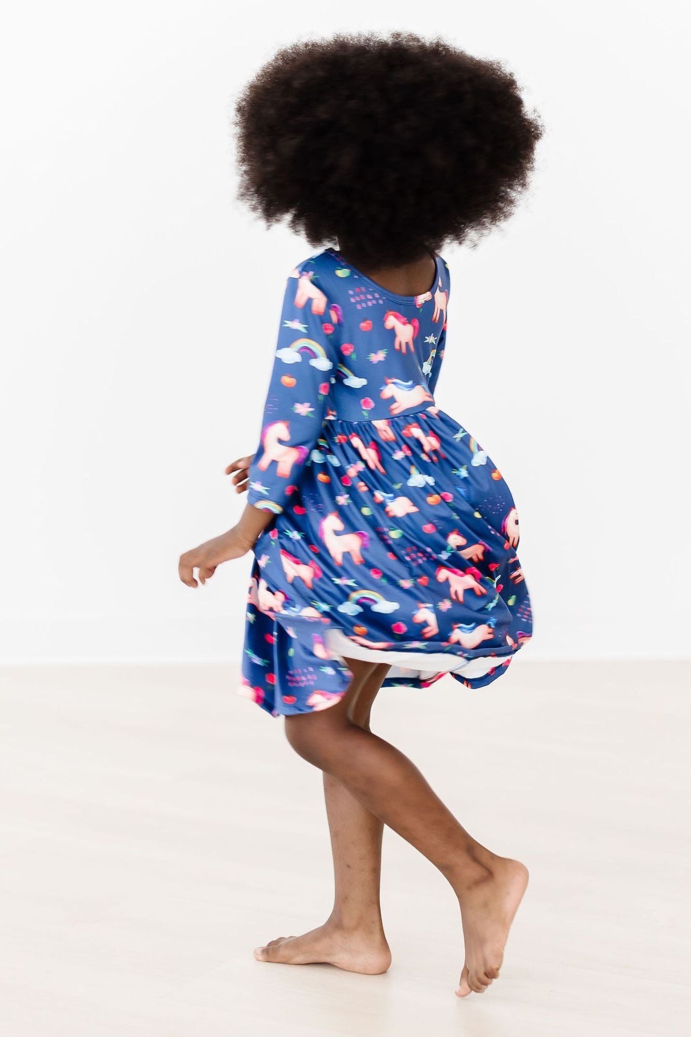 Mila & Rose ® Painted Skies 3/4 Sleeve Pocket Twirl Dress — back view