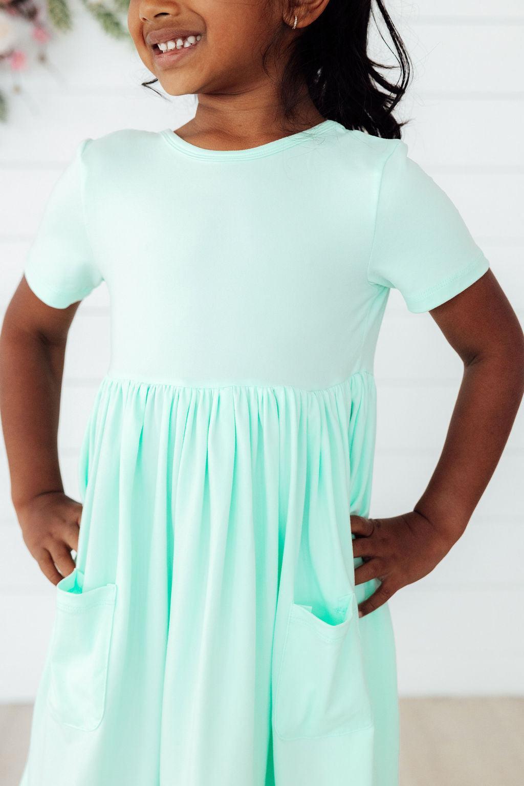 Mila & Rose ® Pastel Green S/S Pocket Twirl Dress — back view