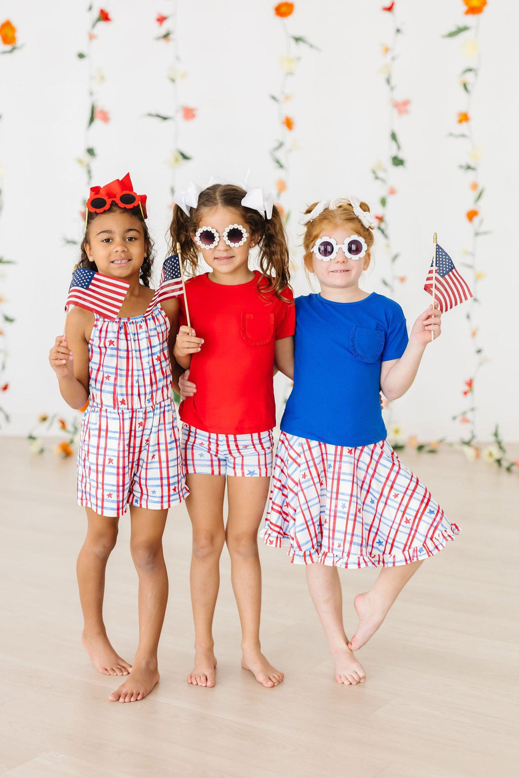 Mila & Rose ® Patriotic Plaid Strappy Play Romper — detail close-up