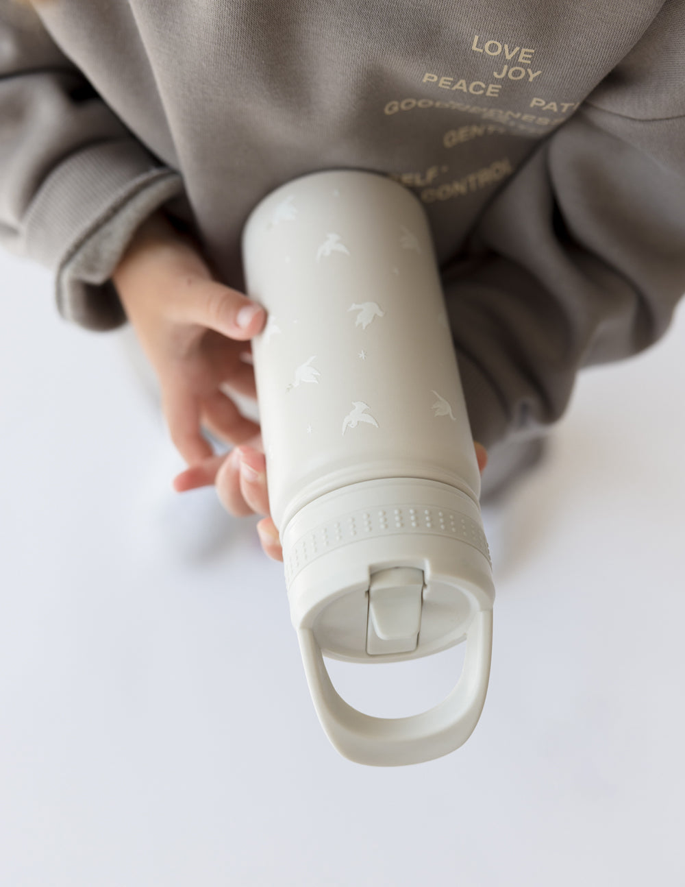 Elevated Faith Peace Kids Water Bottle — lifestyle context