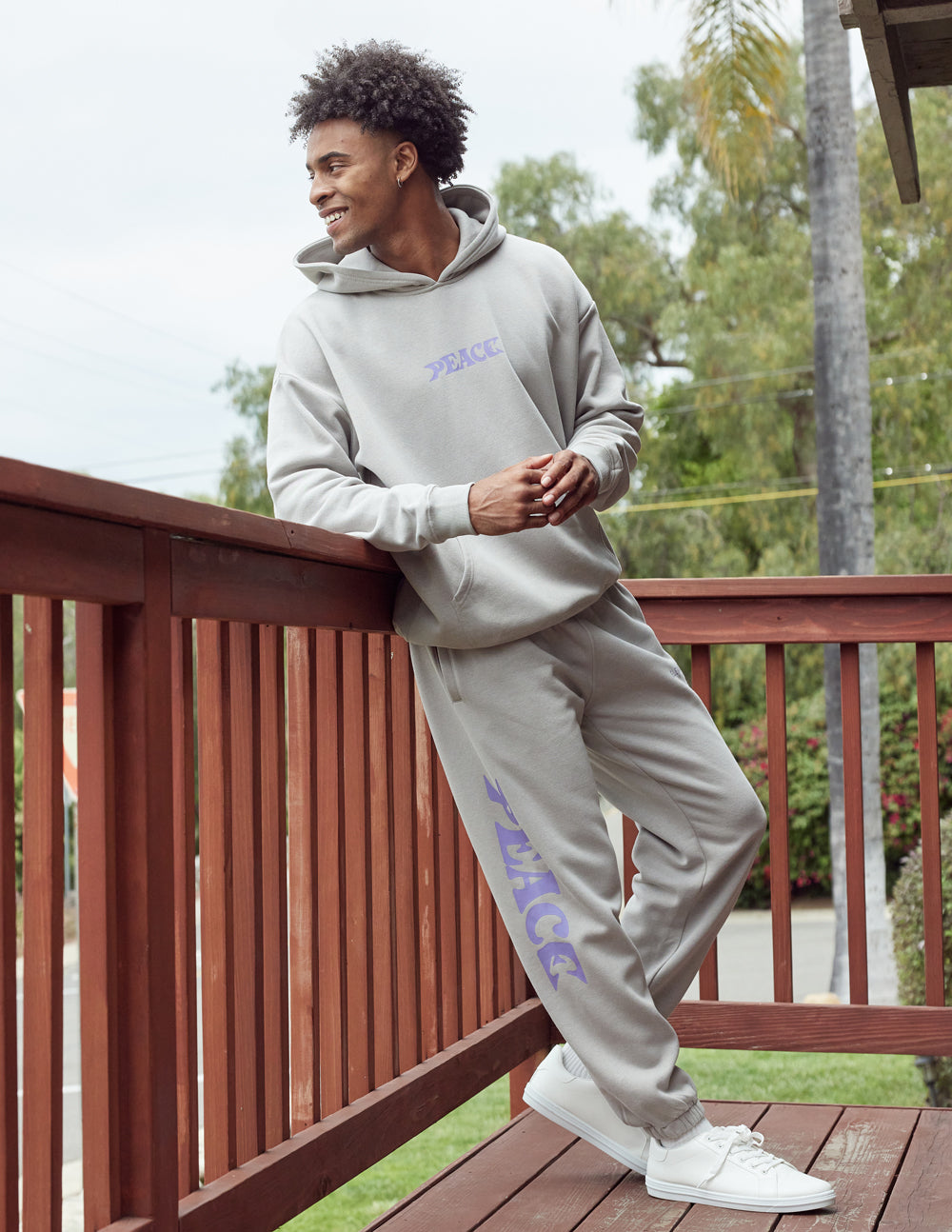 Elevated Faith Peace Unisex Hoodie — lifestyle context