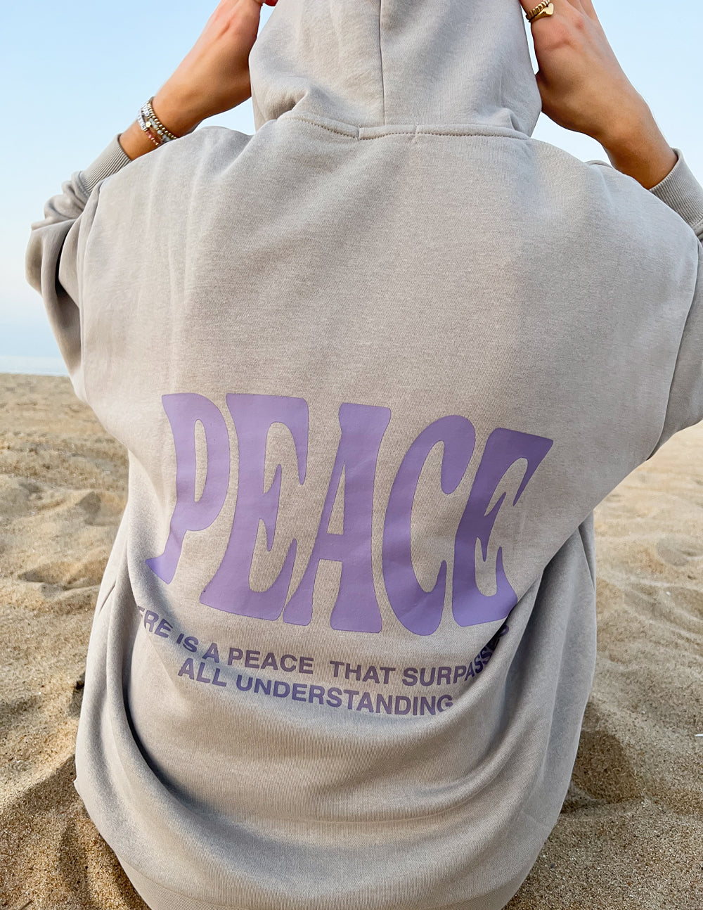 Elevated Faith Peace Unisex Hoodie — in-use photo