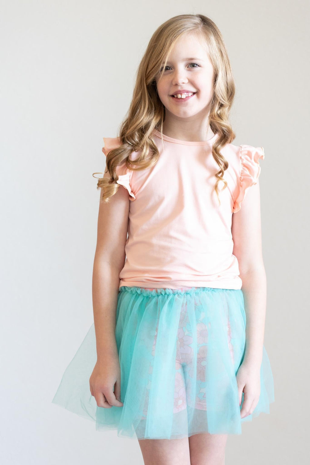 Mila & Rose ® Peach S/S Ruffle Tee — back view