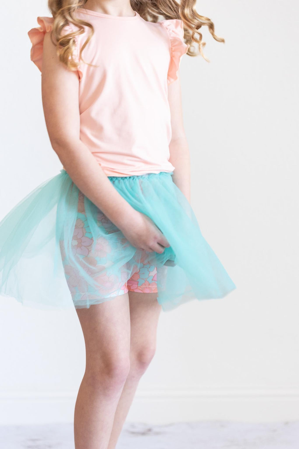 Mila & Rose ® Peach S/S Ruffle Tee — in-use photo