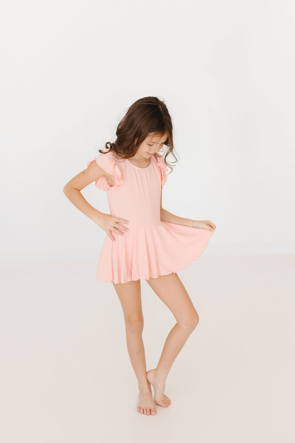 Mila & Rose ® Peach S/S Twirl Leotard — lifestyle context