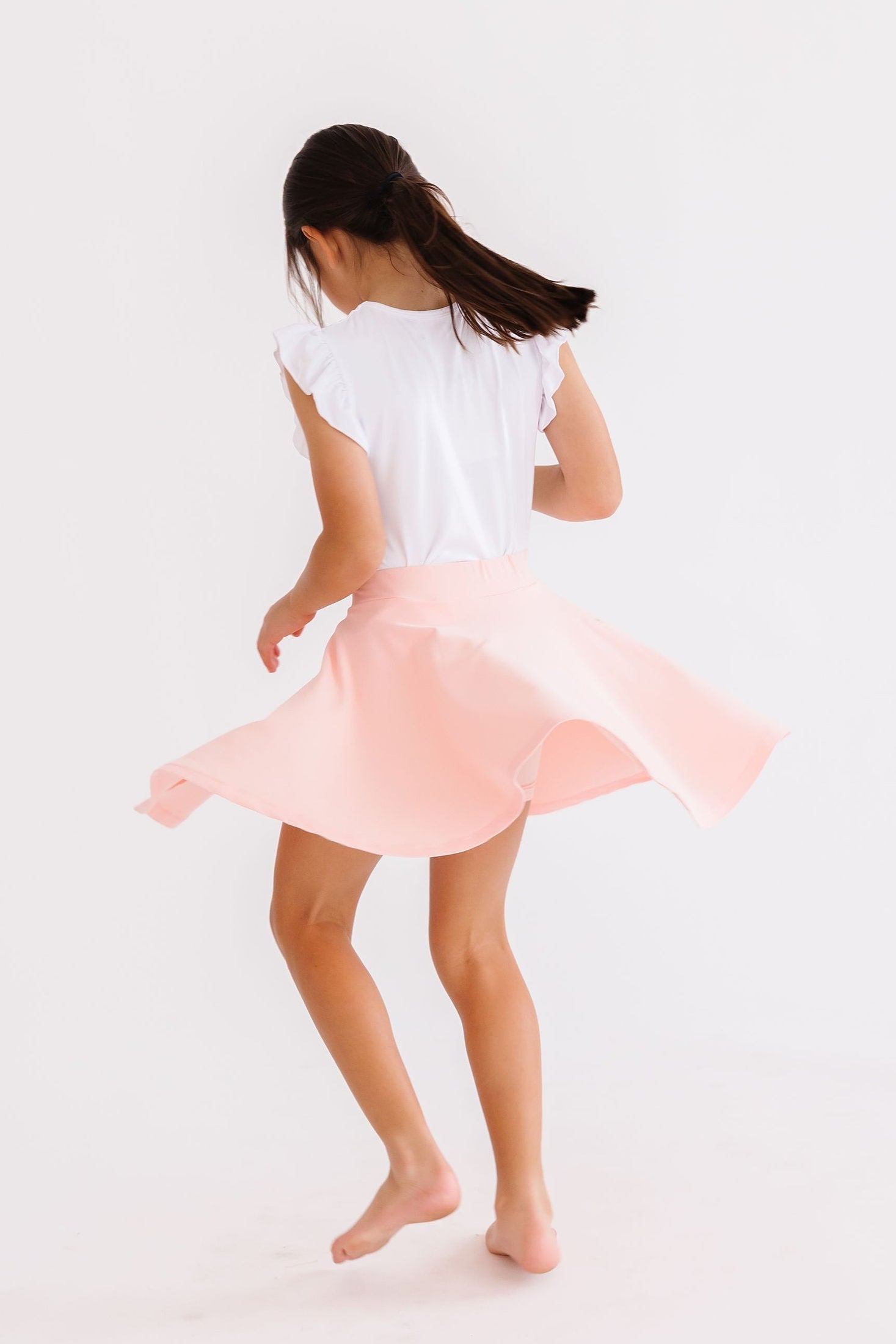 Mila & Rose ® Peach Twirl Skort — lifestyle context