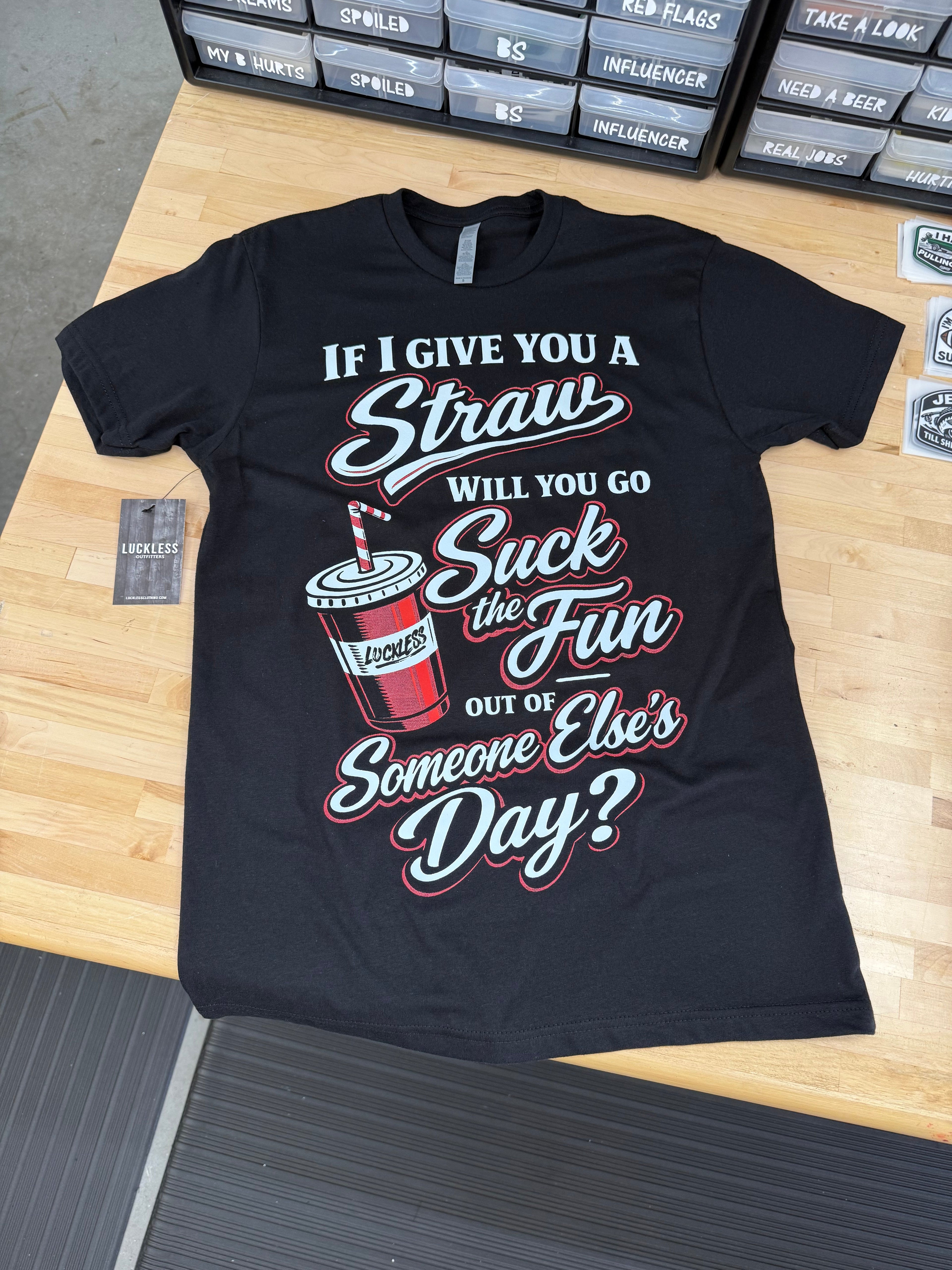 Luckless Outfitters Suck The Fun Tee — lifestyle context