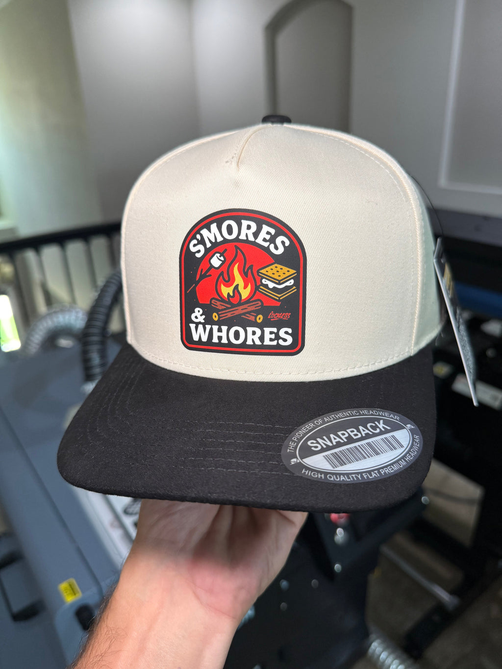 Luckless Outfitters S'mores & Whores Trucker Hat — packaging