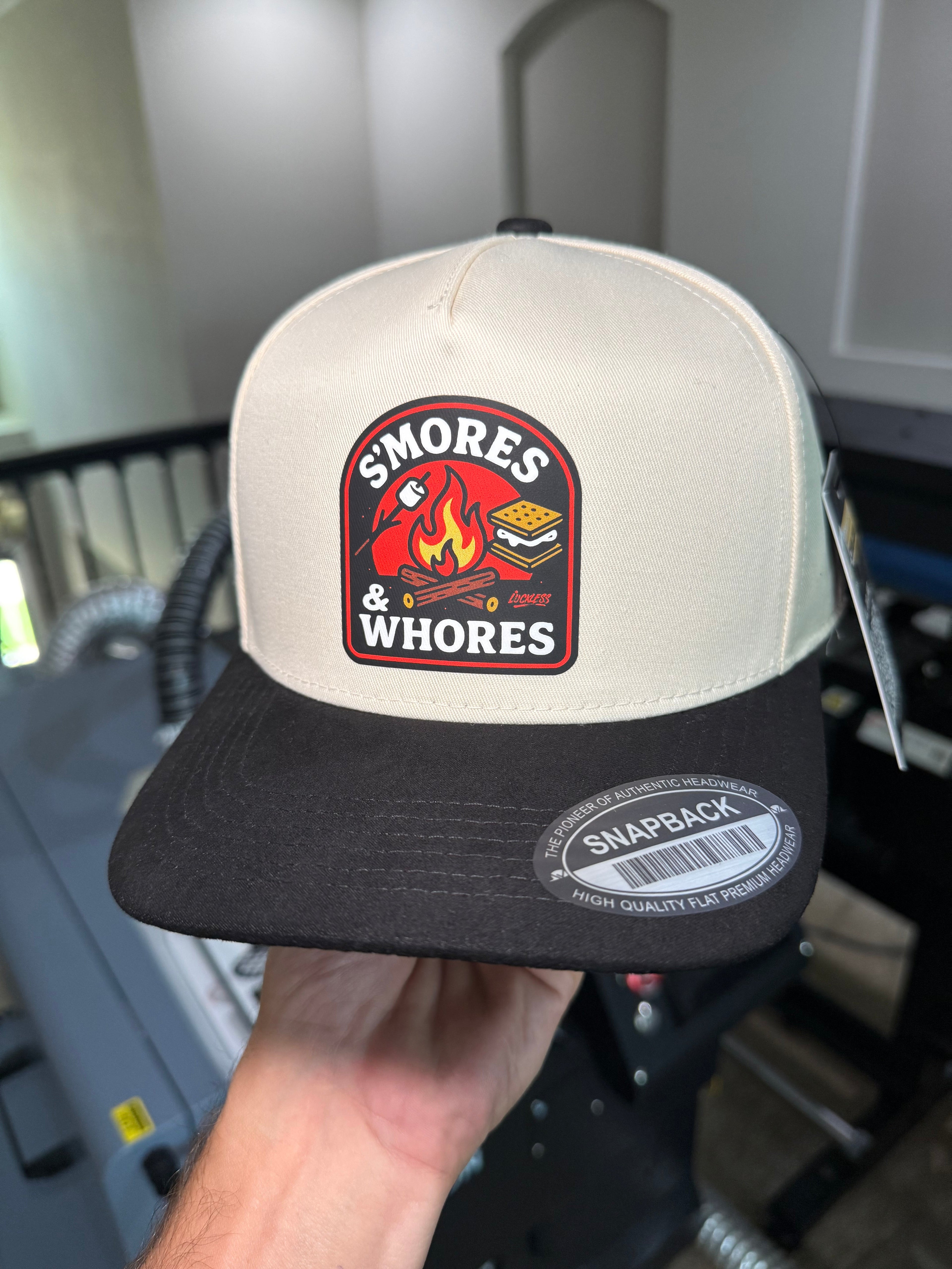 Luckless Outfitters S'mores & Whores Trucker Hat — packaging