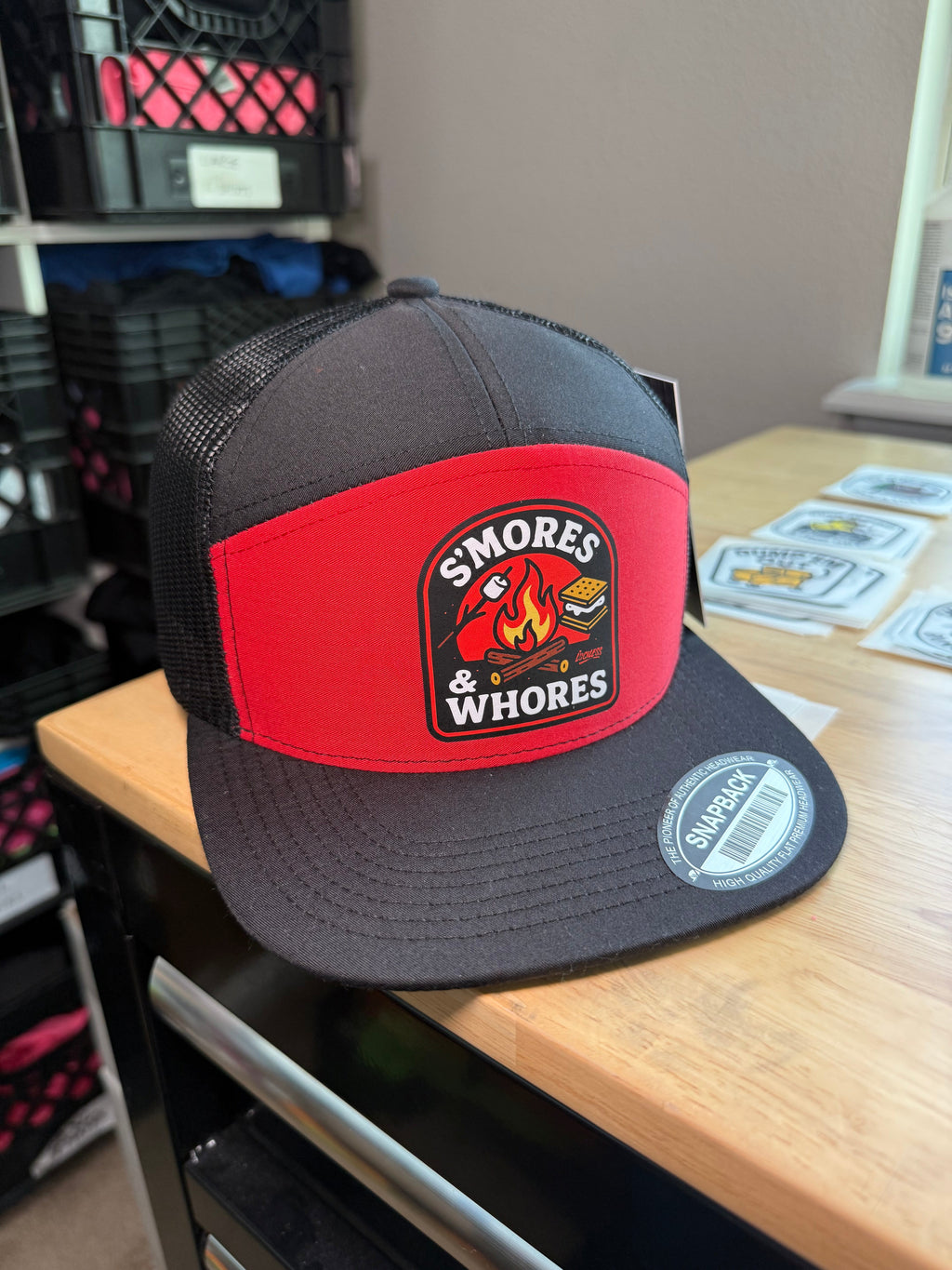 Luckless Outfitters S'mores & Whores Trucker Hat — product on model