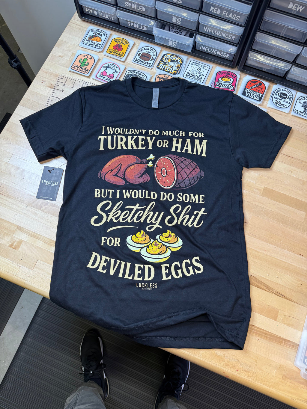 Luckless Outfitters Sketchy for Deviled Eggs Tee — detail close-up