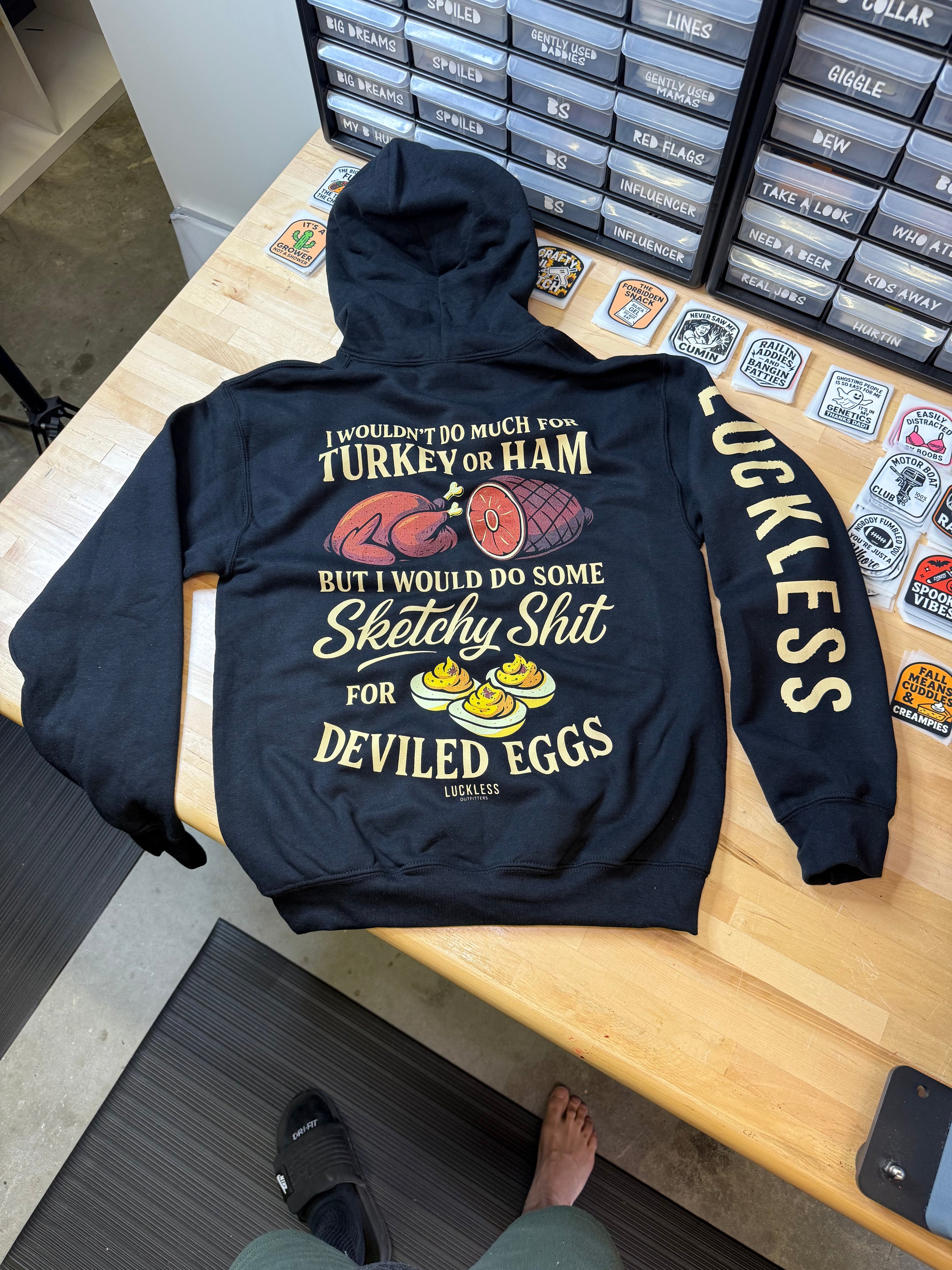 Luckless Outfitters Sketchy for Deviled Eggs Hoodie — detail close-up