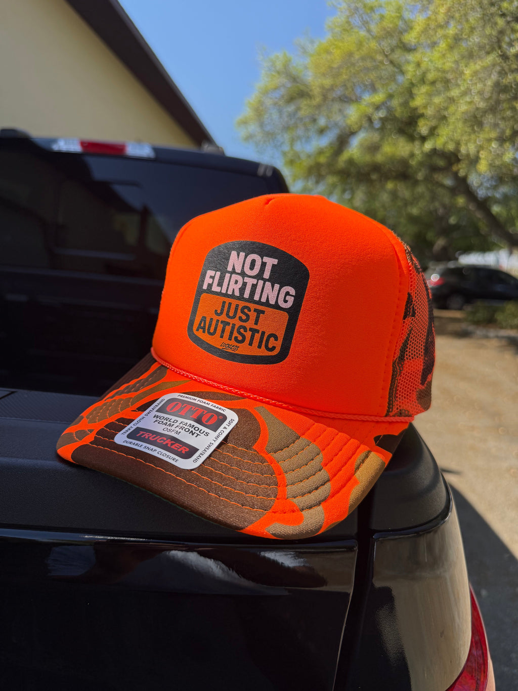 Luckless Outfitters Not Flirting Trucker Hat — back view