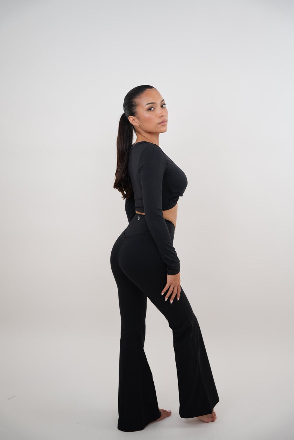 KIMITH BRAND I Am Present Black Stretch Flare Legging — packaging