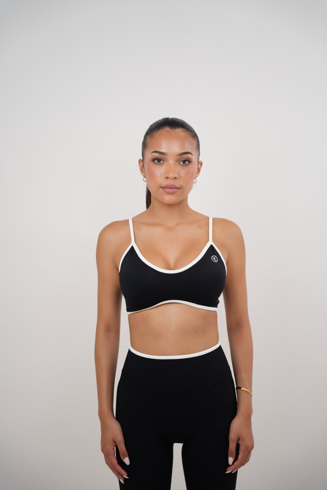 KIMITH BRAND Passion is Power Black Sports Bra — lifestyle context