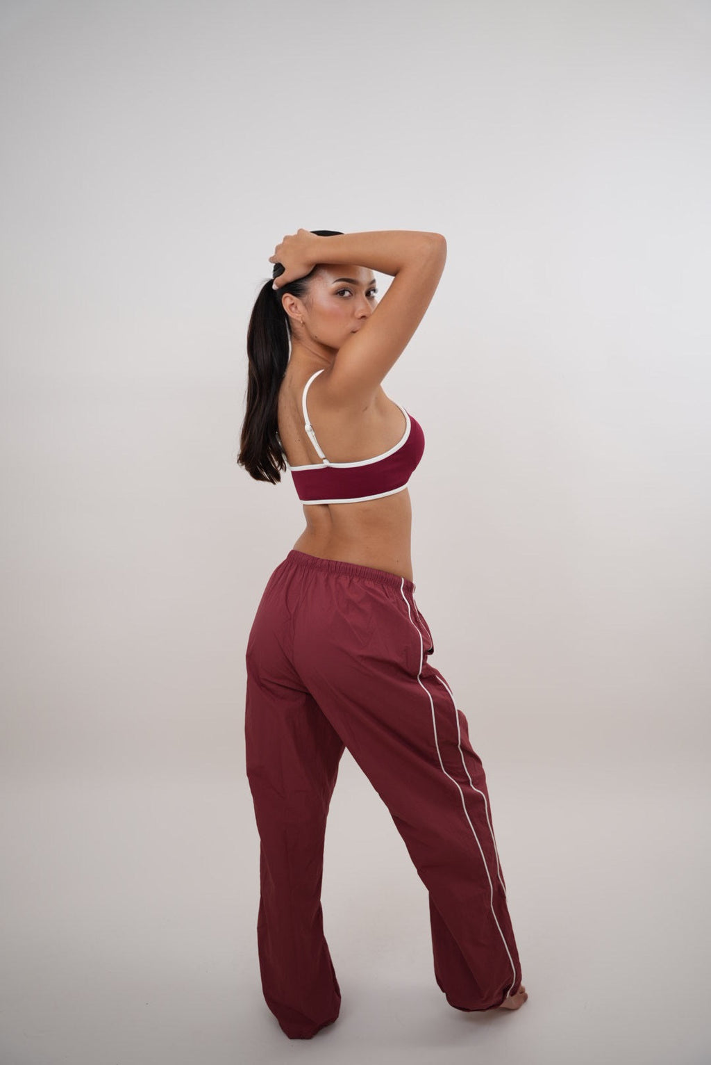 KIMITH BRAND I Accept Change with Grace Red Versatile Relaxed Fit Pant — in-use photo