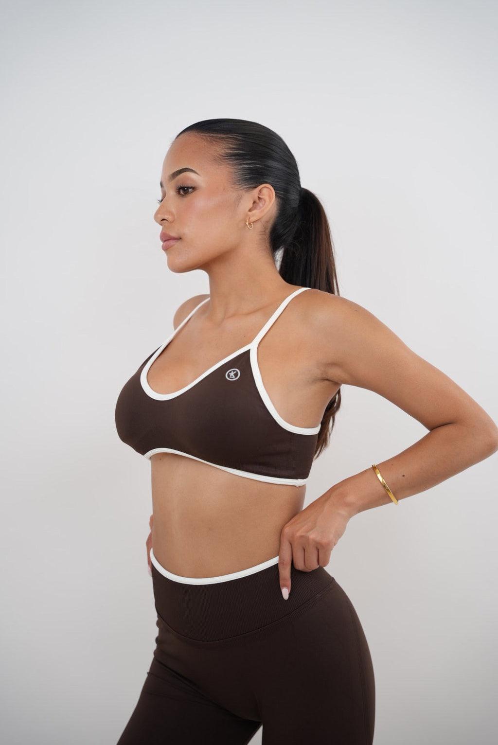 KIMITH BRAND Passion is Power Brown Sports Bra — lifestyle context