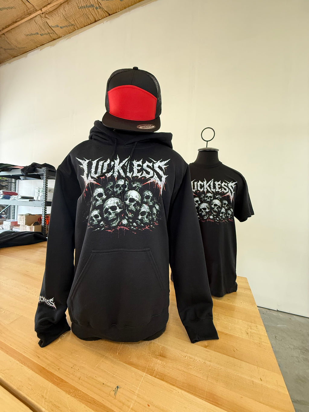 Luckless Outfitters Pile Of Skulls Hoodie — back view