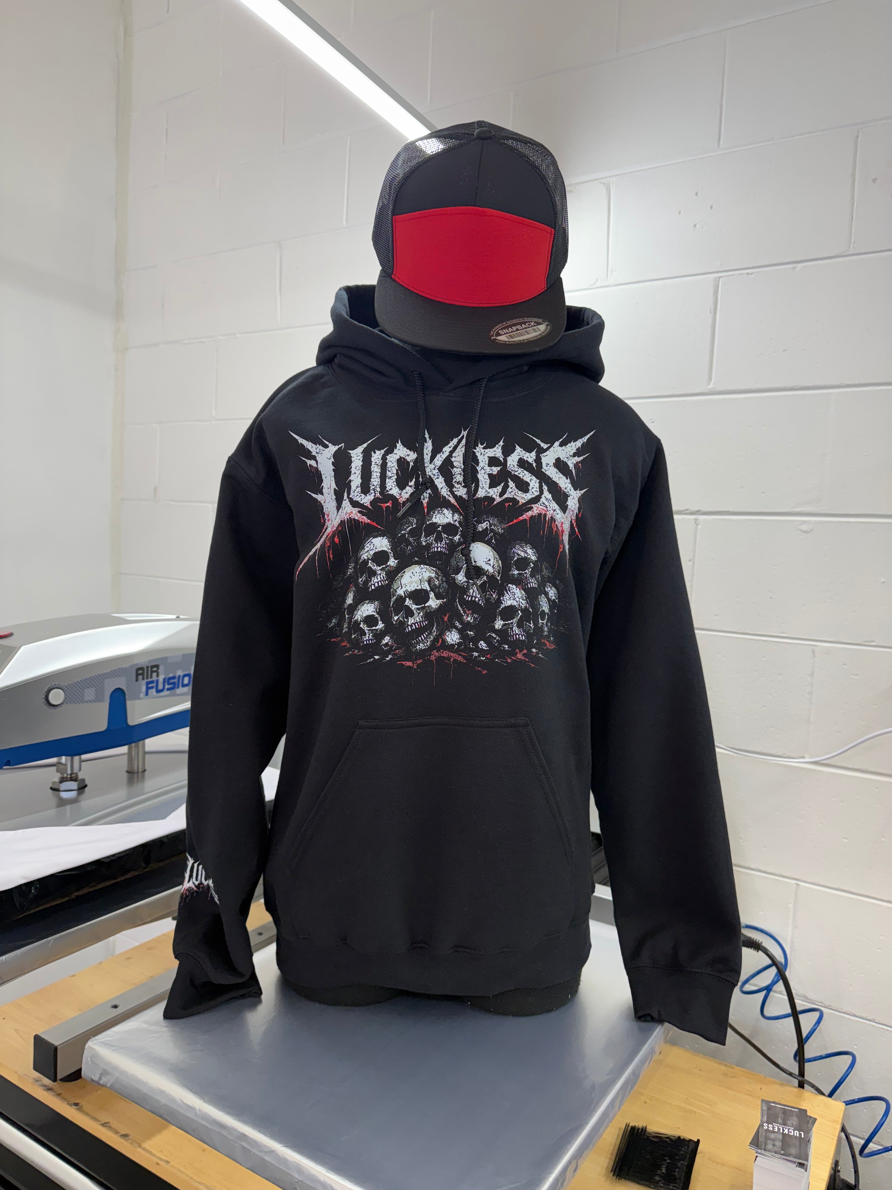 Luckless Outfitters Pile Of Skulls Hoodie — in-use photo
