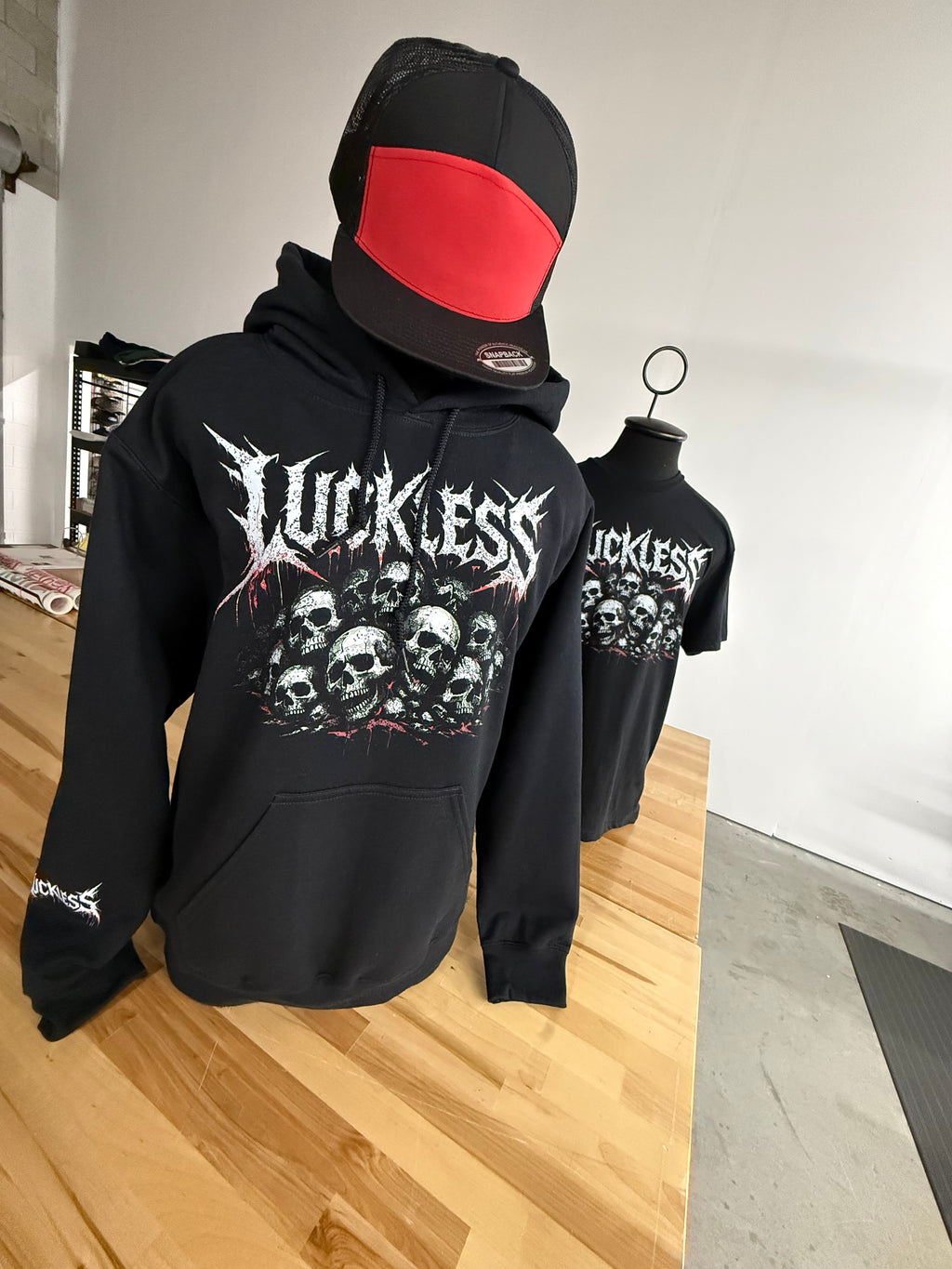 Luckless Outfitters Pile of Skulls Tee — in-use photo