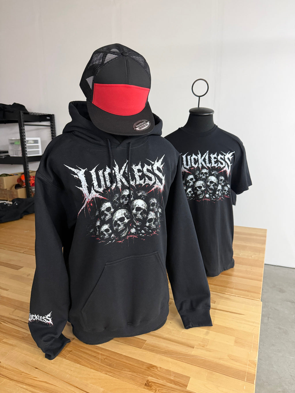 Luckless Outfitters Pile Of Skulls Hoodie — lifestyle context