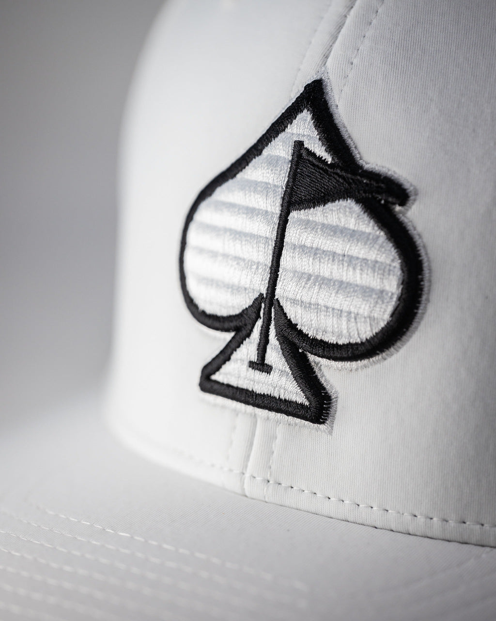 Pins and Aces Performance Spade Hat - White — lifestyle context