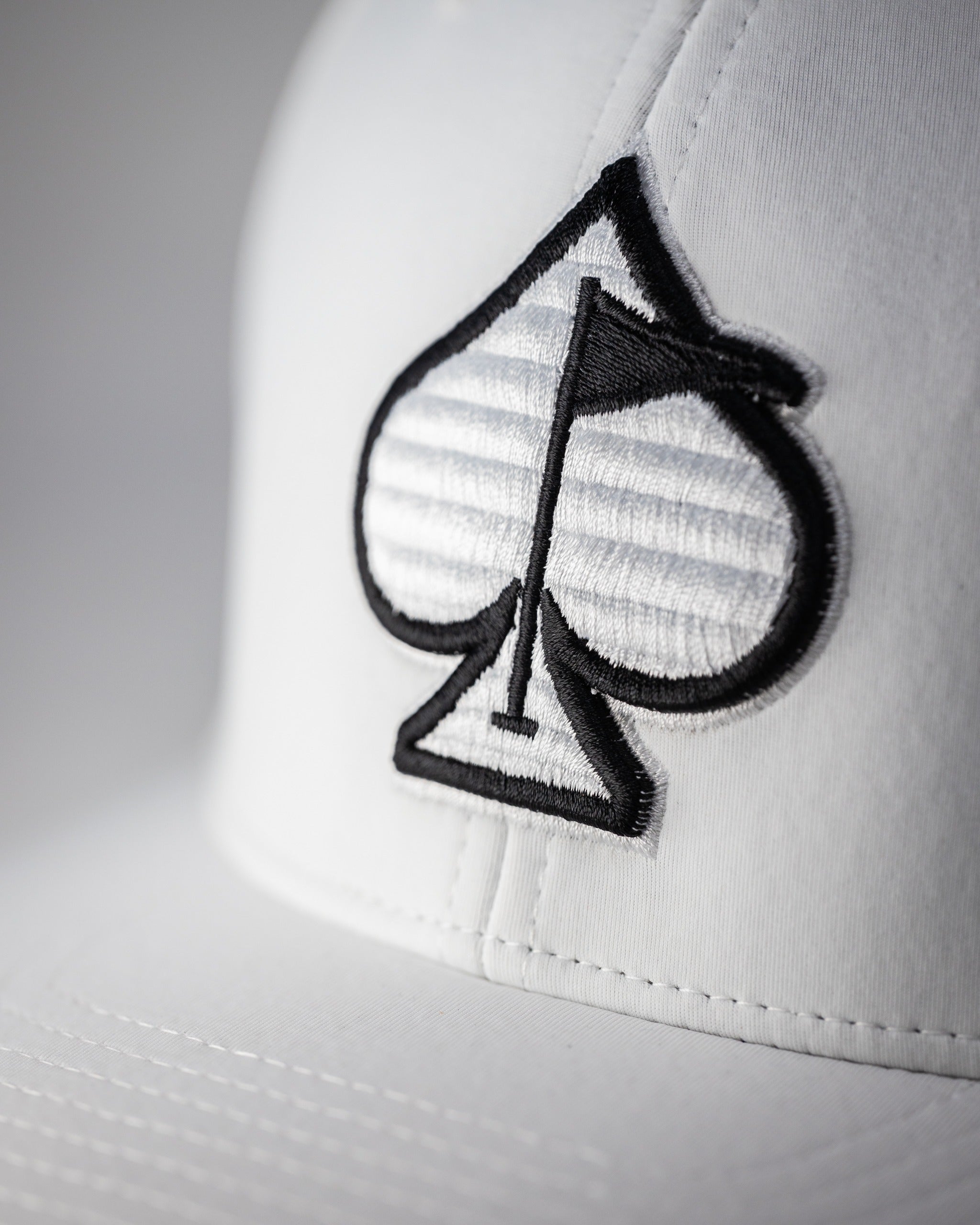 Pins and Aces Performance Spade Hat - White — lifestyle context