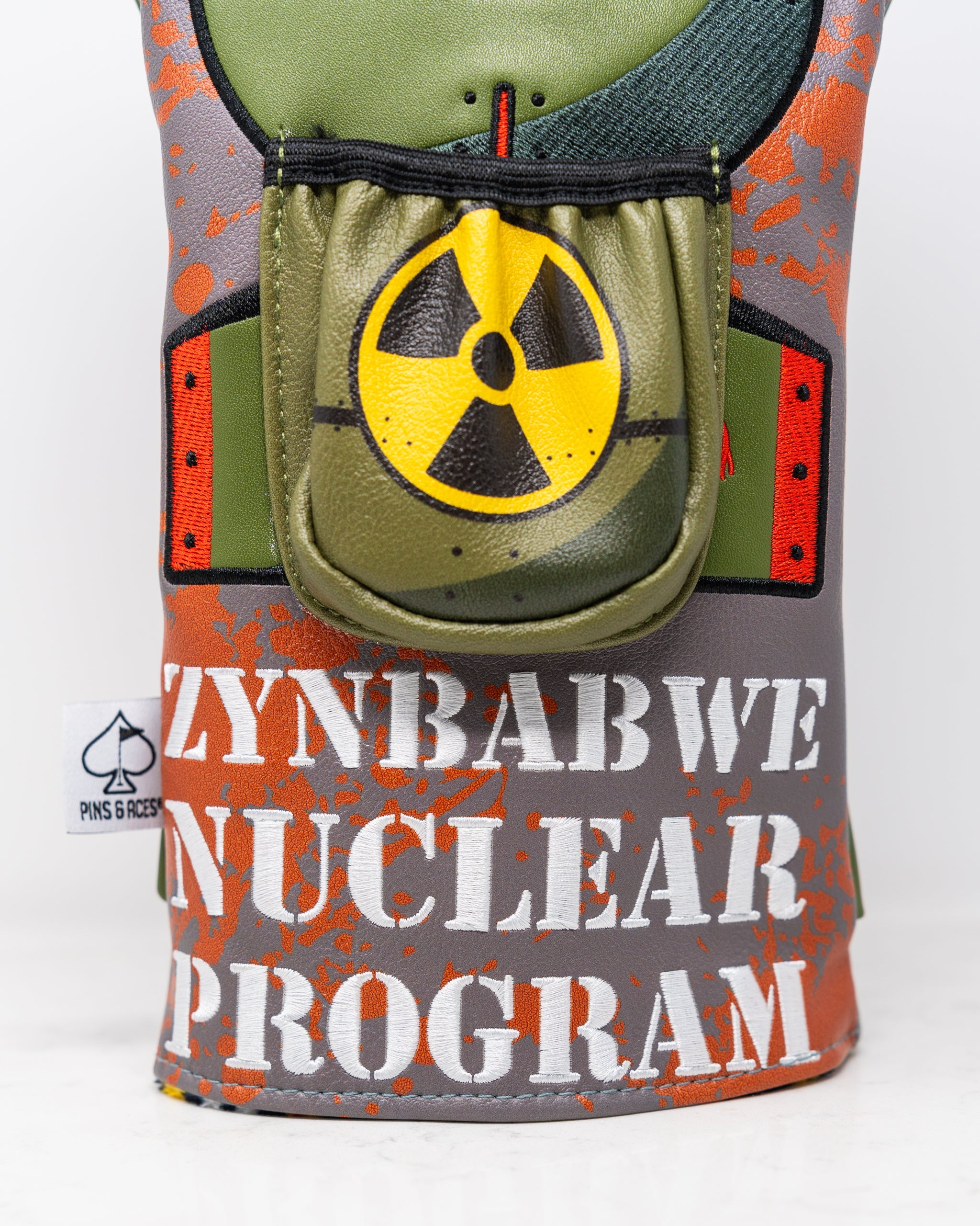Pins and Aces Zynbabwe Nuclear Program - Driver Cover — lifestyle context