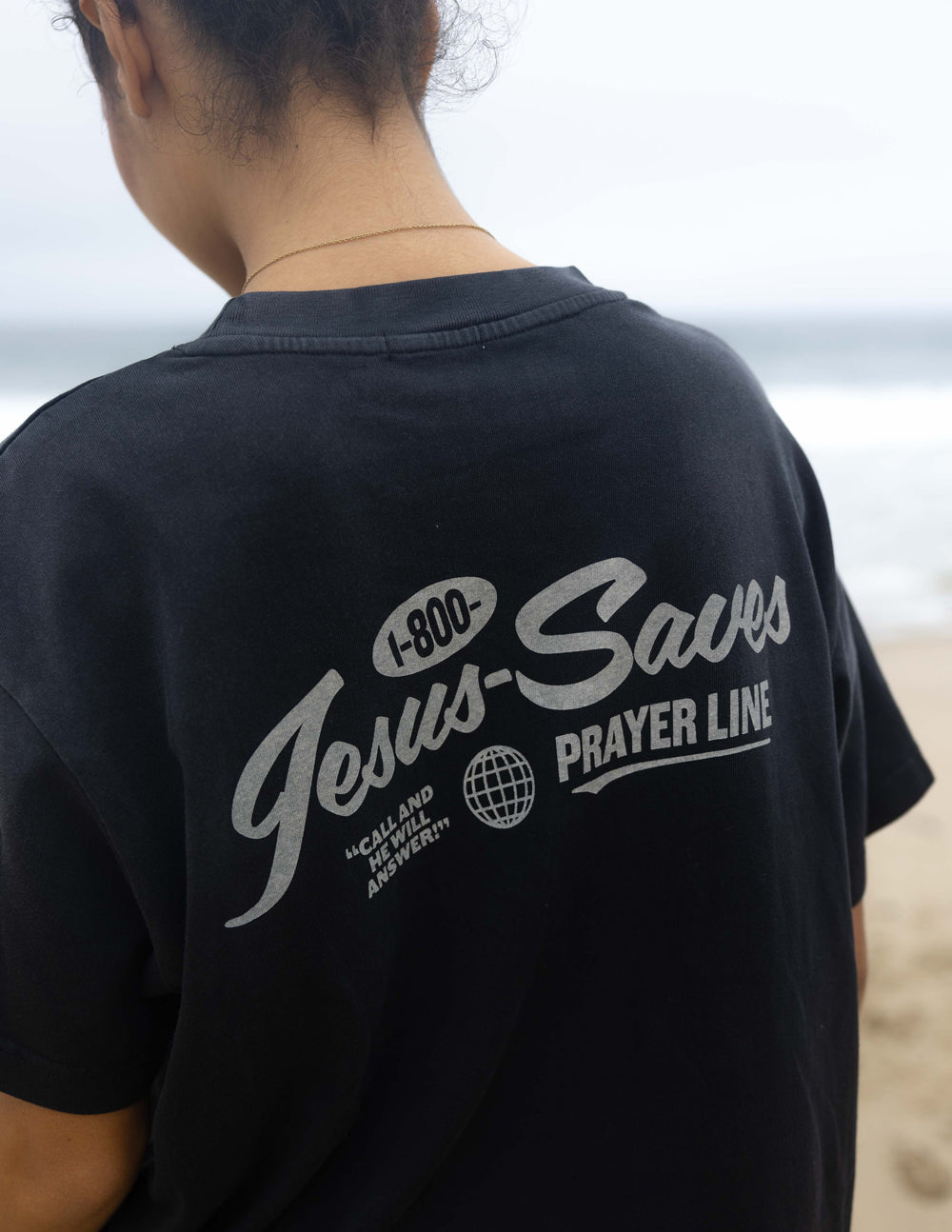 Elevated Faith Prayer Line Unisex Tee — lifestyle worn / used context