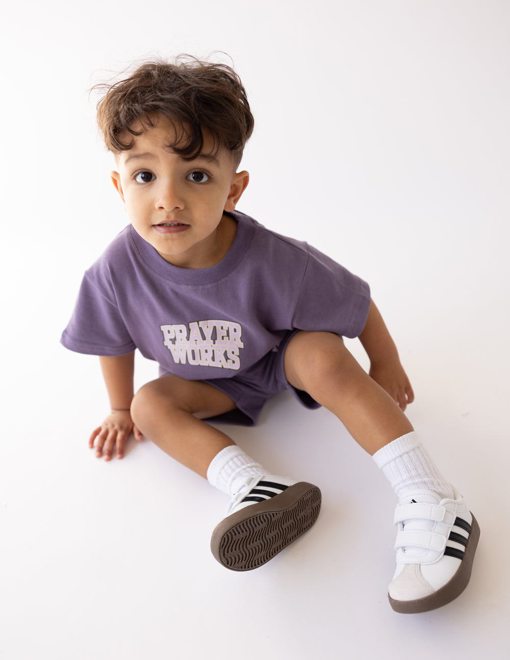 Elevated Faith Prayer Works Kids Tee — detail close-up