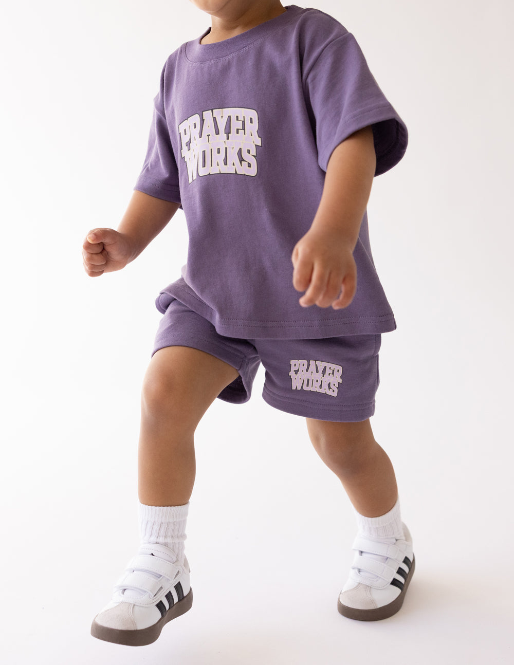 Elevated Faith Prayer Works Kids Tee — lifestyle context