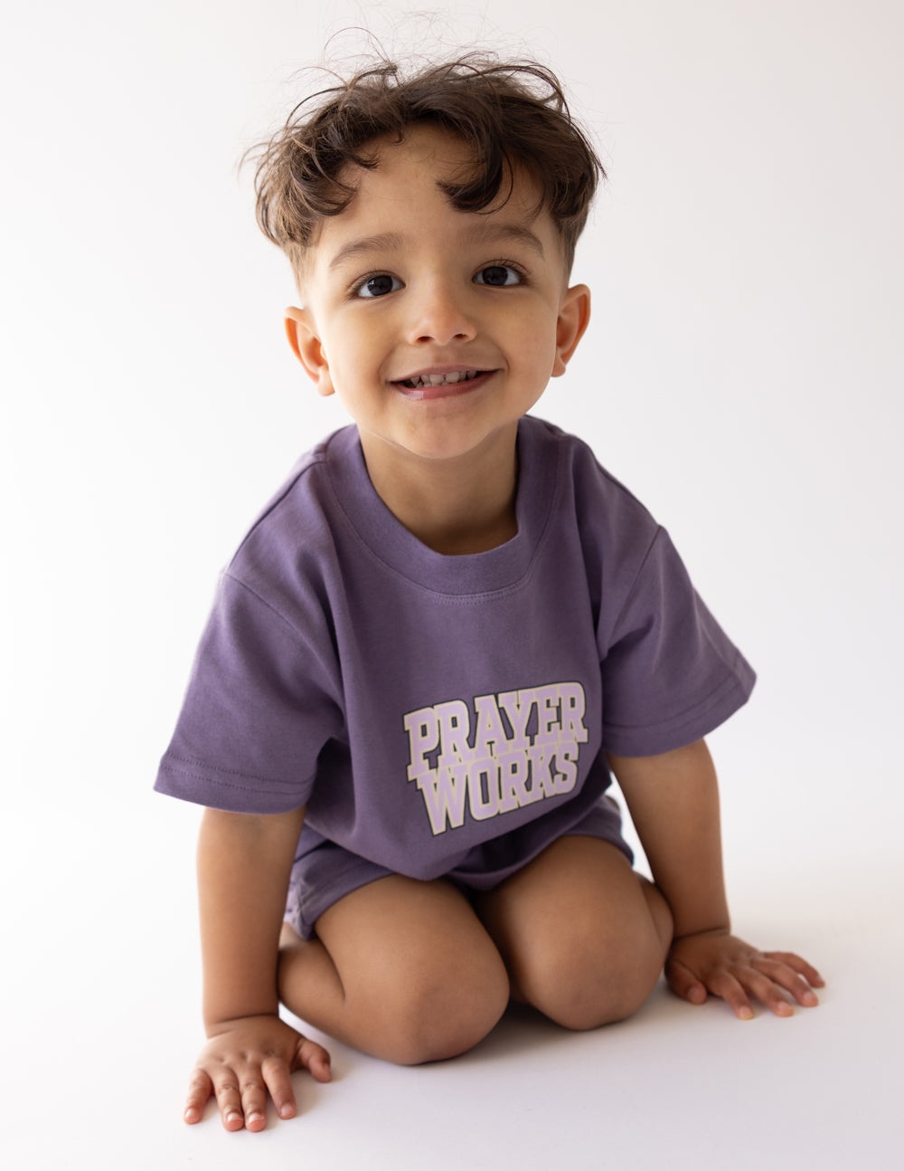 Elevated Faith Prayer Works Kids Tee — side view