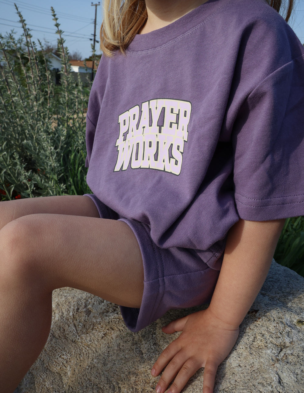 Elevated Faith Prayer Works Kids Tee — in-use photo