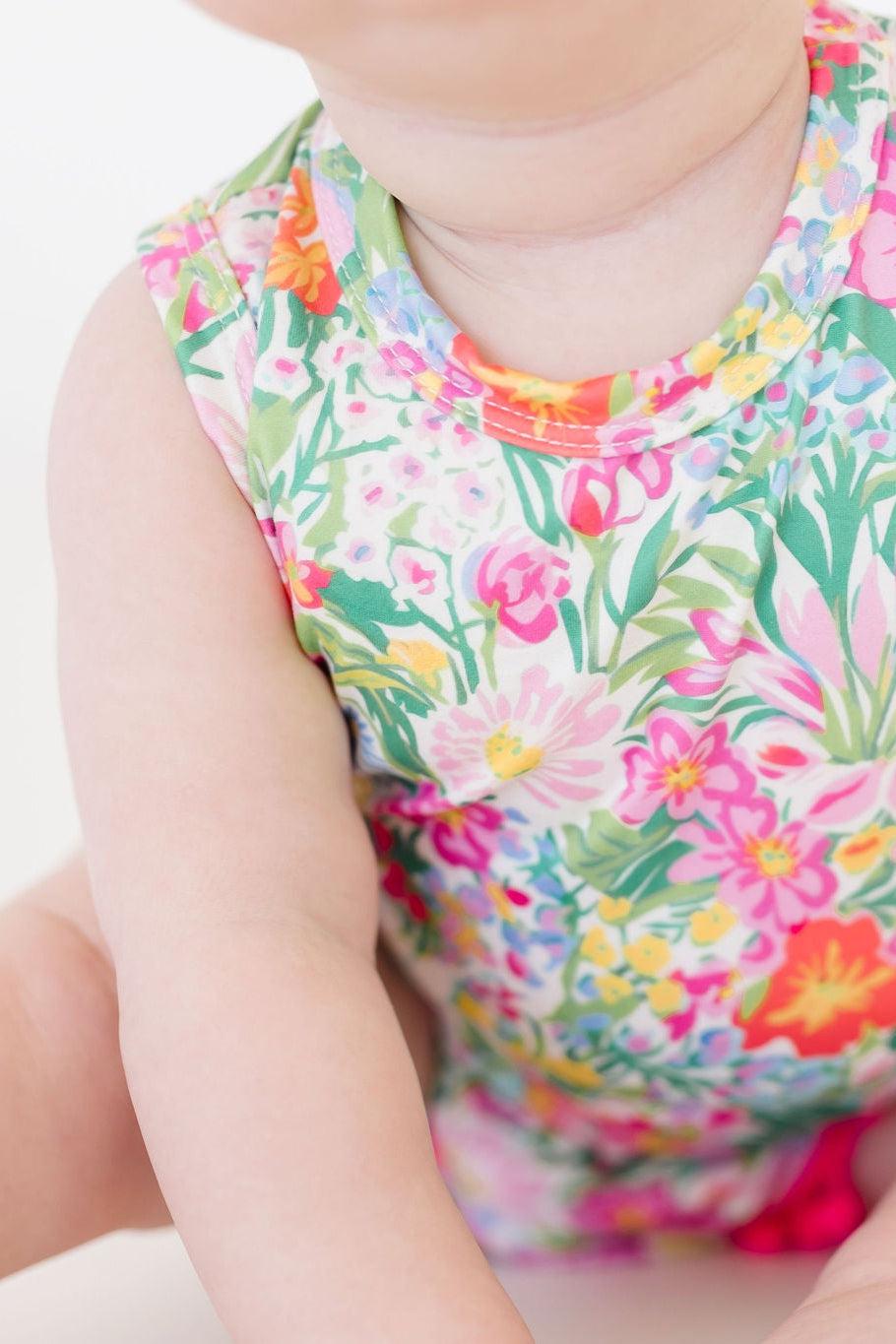 Mila & Rose ® Preppy Petals Pom Pom Romper — lifestyle context