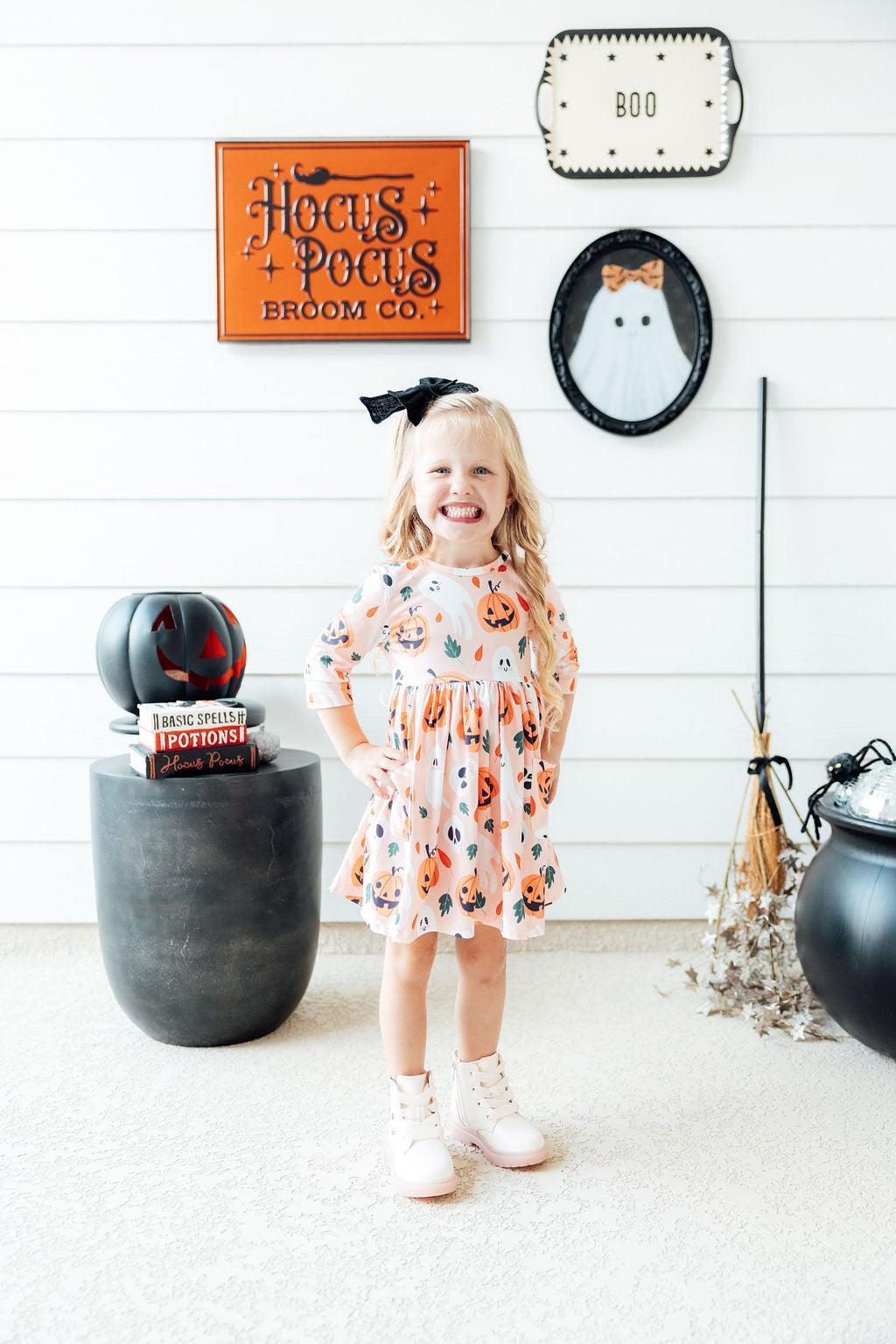 Mila & Rose ® Pumpkin Peekaboo 3/4 Sleeve Pocket Twirl Dress — in-use photo
