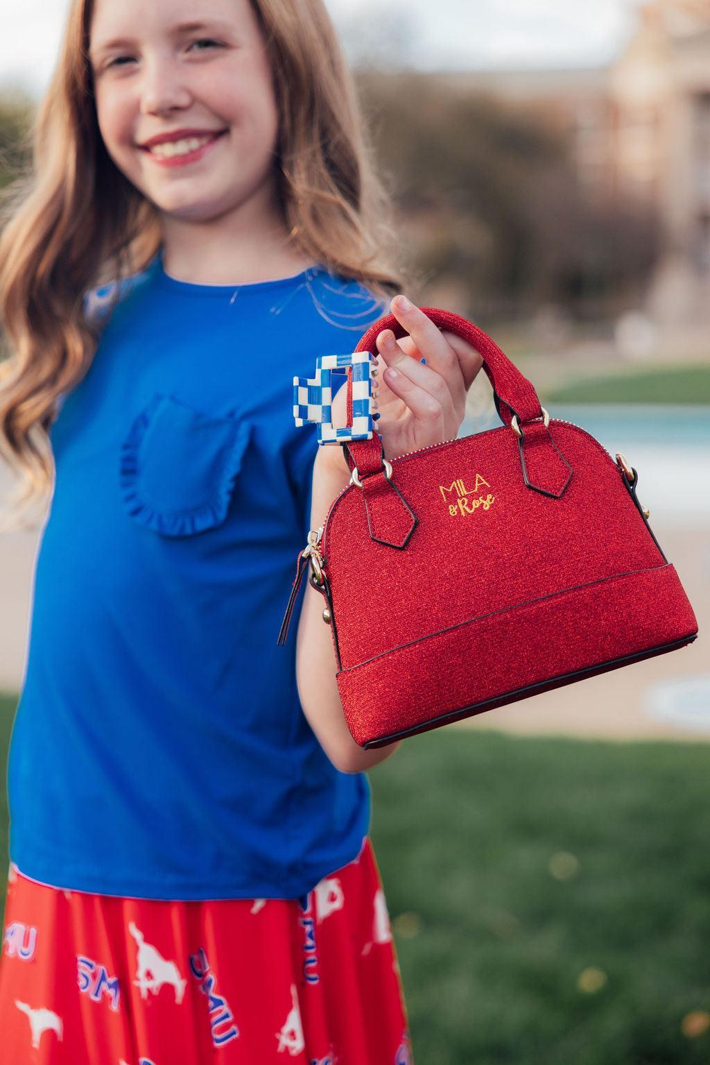Mila & Rose ® Red Shimmer Girl's Crossbody Purse — lifestyle context