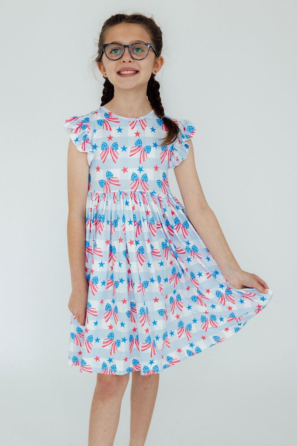 Mila & Rose ® Red, White & Bows Flutter Sleeve Twirl Dress — lifestyle context